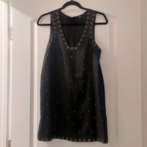 Free People mini dress black w/ gold studs. Sizing tag removed likely small 2-4